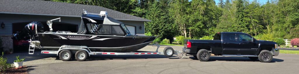 black truck towing duckworth boat to go shrimping