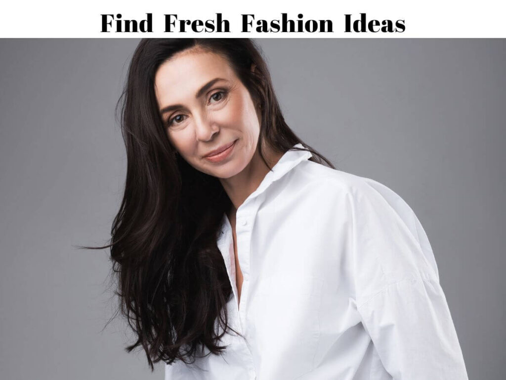 middle-aged brunette woman wearing white shirt
