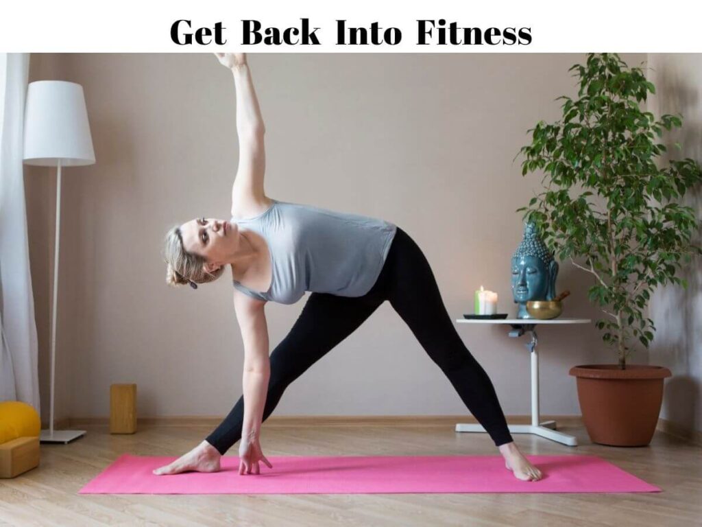 woman exercising on mat