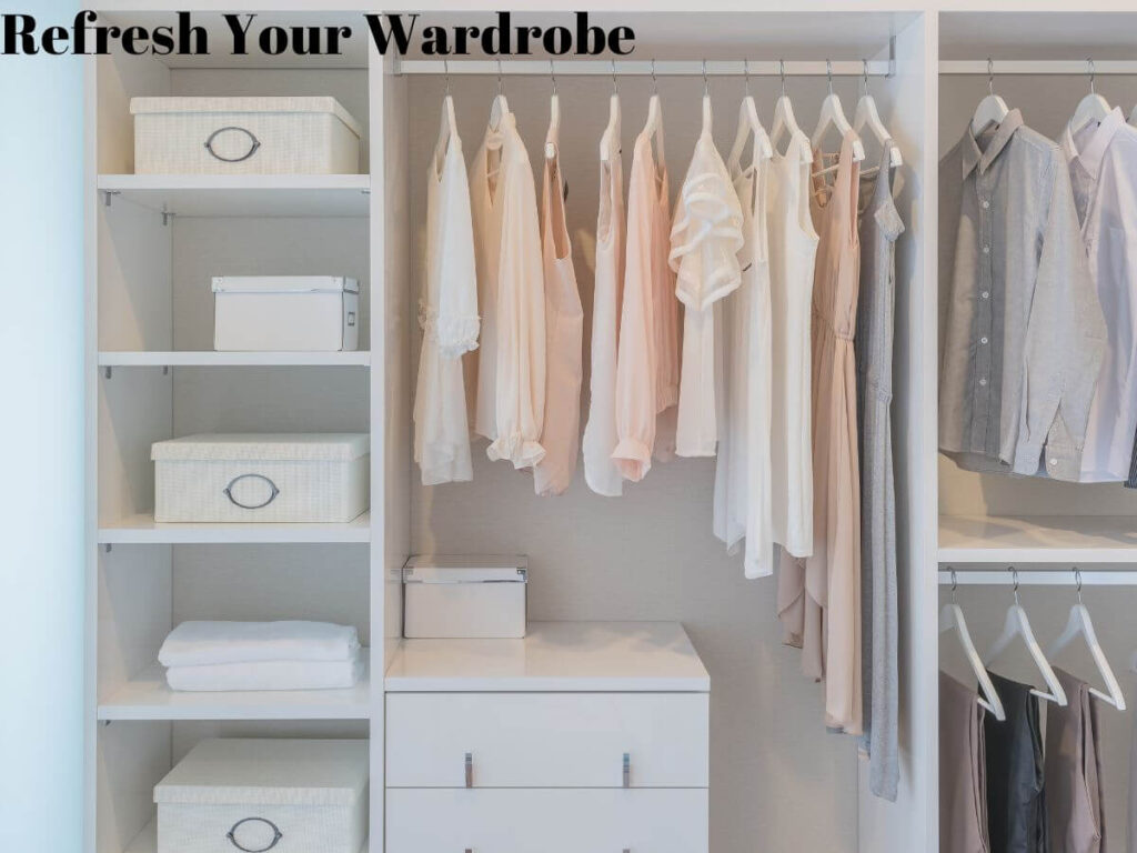 baskets shirts dresses pants in well-organized closet