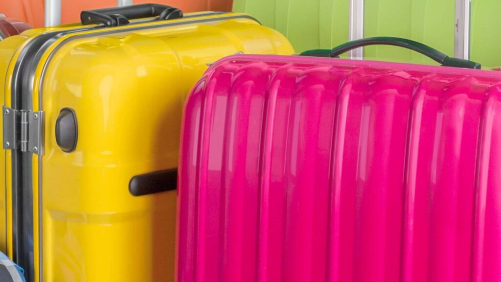 yellow pink luggage