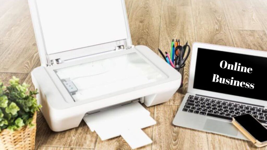 plant printer pencils laptop computer cell phone