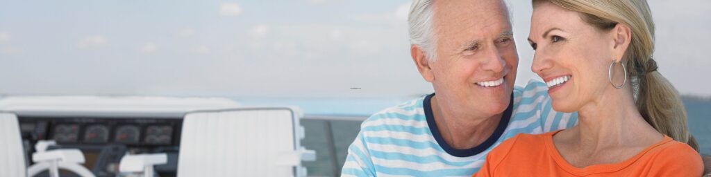 middle-aged empty nester couple reconnecting while boating